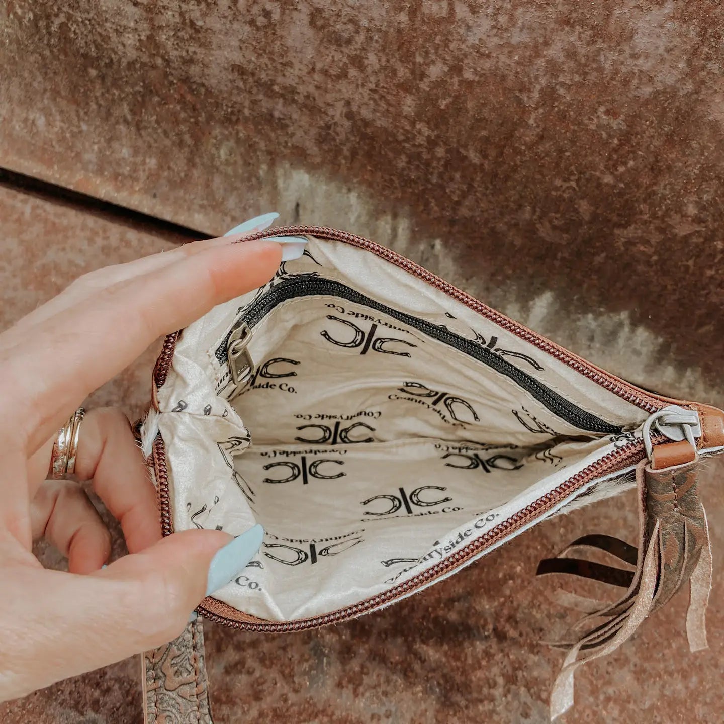 BROWN COWHIDE WRISTLET